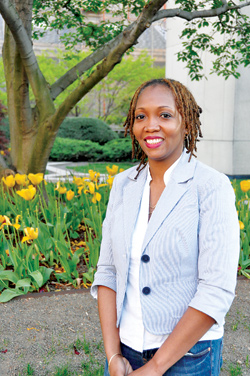 More than a decade after deciding to leave the finance world, Karen Clayton, GSE ’12, earns her doctorate in educational psychology this weekend. Photo by Joanna Klimaski