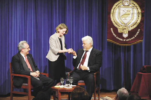 GSAS Dean Nancy Busch, center, presents Kamal Y. Azari, Ph.D., GSAS ’88, with a GSAS crystal insignia. To the left is Azari’s Fordham mentor, John Entelis, Ph.D., professor of political science and director of the Middle East Studies Program. Photo by Chris Taggart