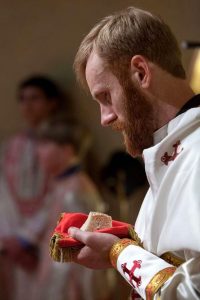 Baker at his ordination.