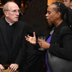 Father McShane with Anne Williams-Isom.