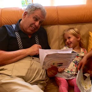 MIsha Zigelbaum and his granddaughter.