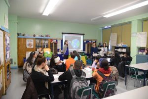 Fordham Law students Sara Gates, Elena Rizzo and Noelle Park with students from P.S. 191