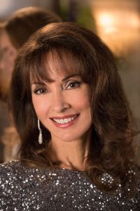 Susan Lucci as Genevieve Delatour on the Lifetime series Devious Maids