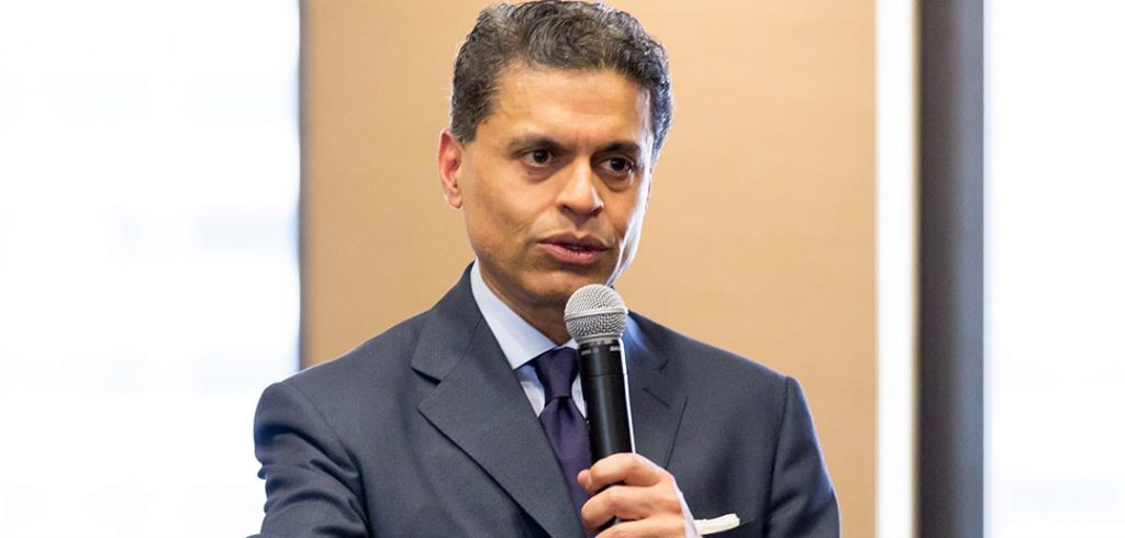 Fareed Zakaria and Eva Badowska