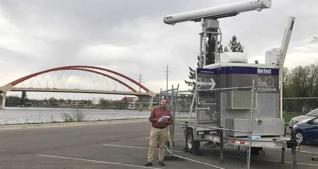 J. Alan Clark, Ph.D., an associate professor in the Department of Biological Sciences, stands alongside an avian radar near the Hastings Bridge in Hastings, MN on April 24, 2017.