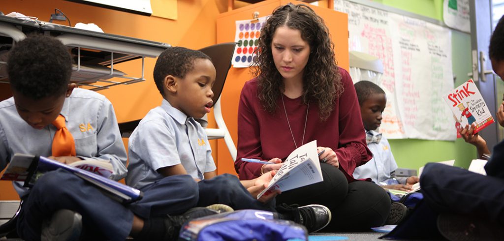 Kristen Guzman with her students.