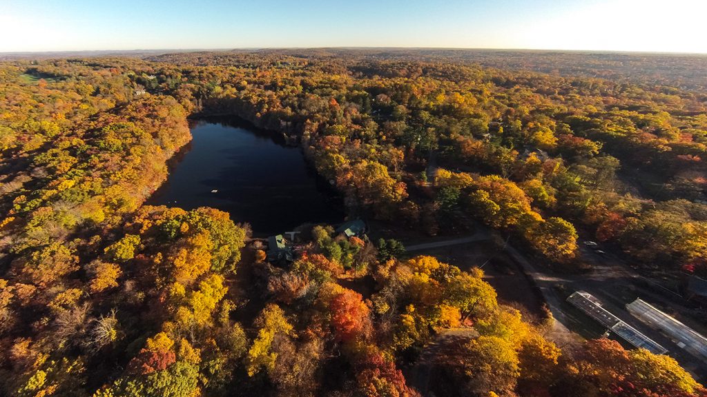 An aerial view of the Calder Center, with Calder lake in the background.