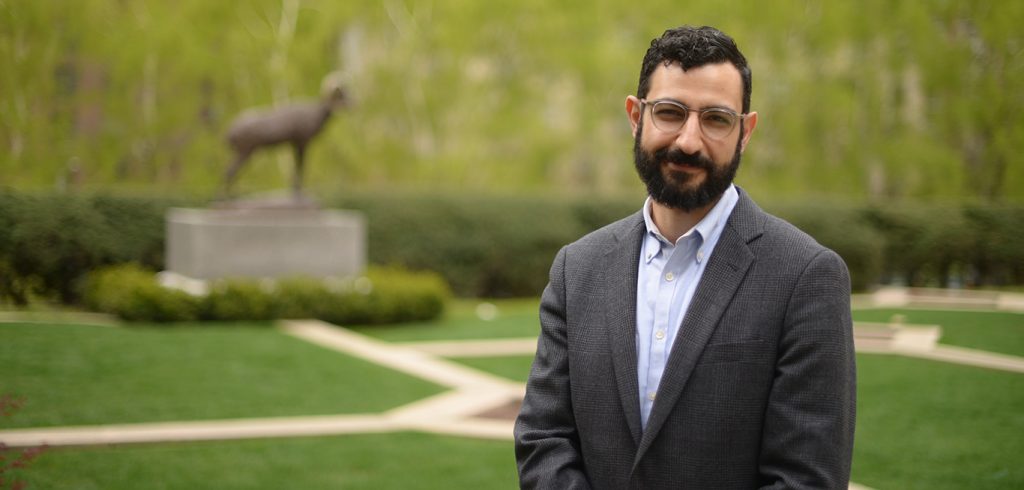 Badr Albanna standing on the plaza at the Lincoln Center campus