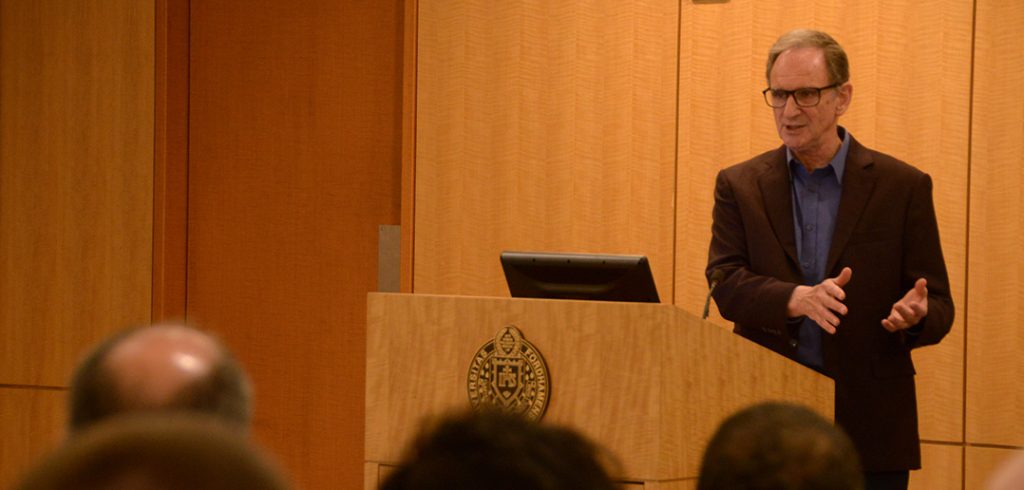 Martin Hellman addresses a crowd of students at the Rose Hill campus