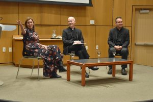 Elizabeth Coffman, James Martin and Mark Bosco on stage at the McNally Ampitheatre