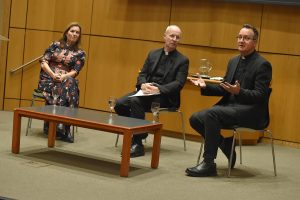 Elizabeth Coffman, James Martin and Mark Bosco on stage at the McNally Ampitheatre