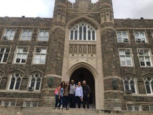 Italian exchange students stand on the steps of Keating Terrace