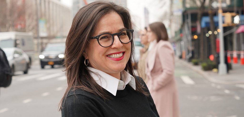 Jacqueline Reich standing in the middle of Columbus Avenue