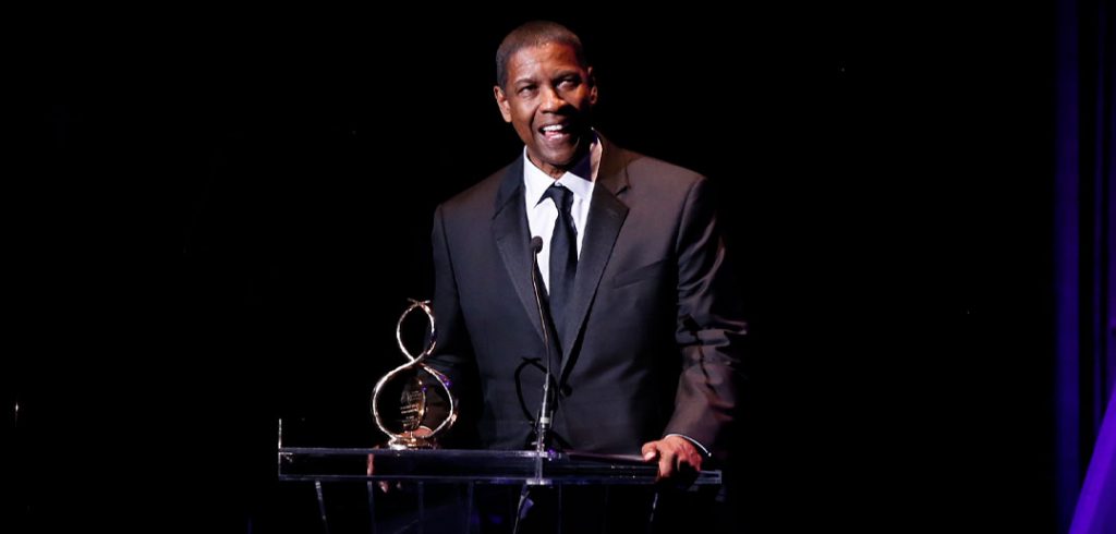 Denzel Washington receives an honor from the Crossroads Theatre Company.