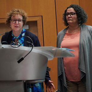 Susan Matloff-Nieves Goddard Riverside's deputy executive director, and Dalys Castro, the Lincoln Square Neighborhood Center site director, thank the crowd for their donations to the center. 