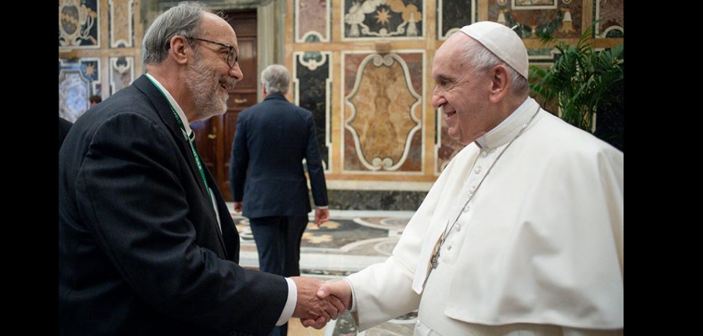 Henry Schwalbenberg shaking hands with the Pope