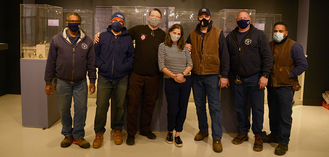 Udell with the team from facilities who helped renovate the gallery on December 16, the day of the show's soft opening.