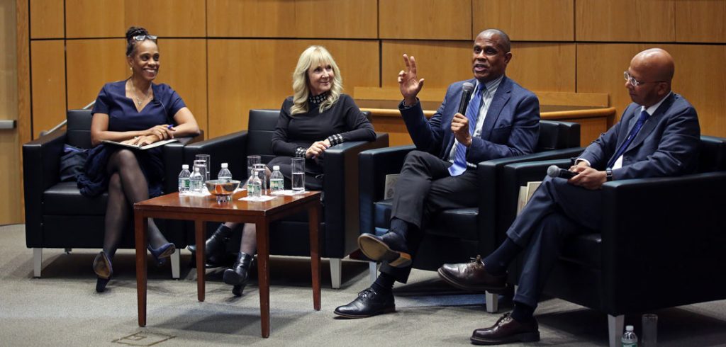 Four people on a panel