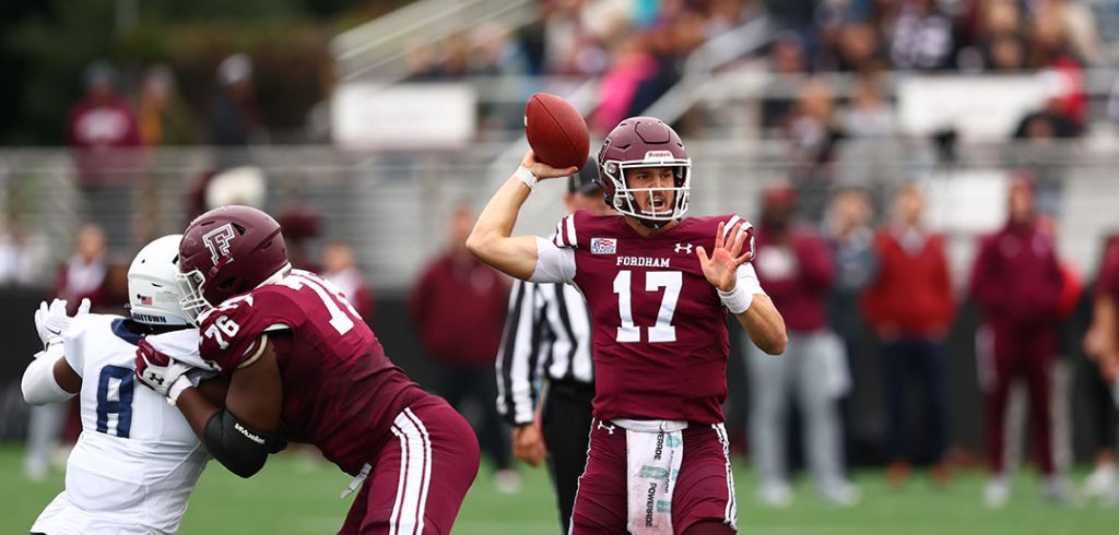 Fordham quarterback Tim DeMorat prepares to make a pass in a game against Georgetown in October 2022