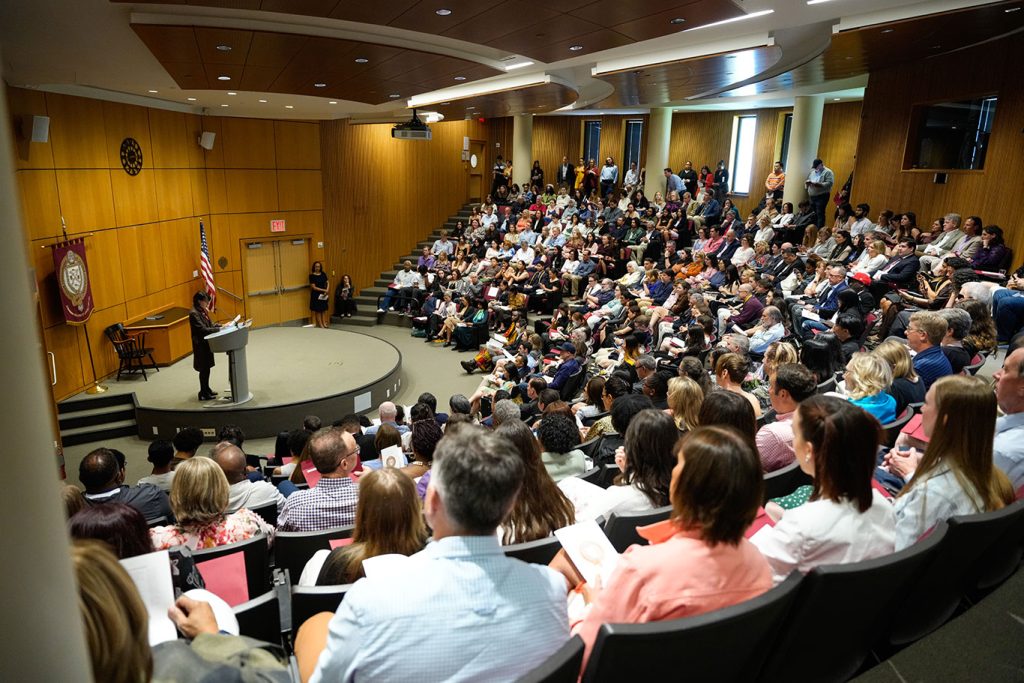 a view from above of people seated in the McNally Ampitheatre