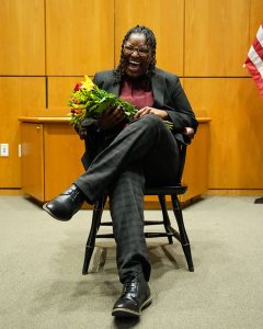 Amara McNeil seated in a chair