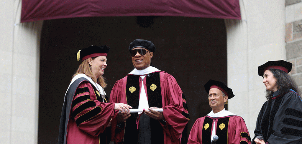 Stevie Wonder receives honorary degree on Commencement stage from Tania Tetlow