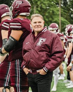 Joe Moglia on the sidelines.