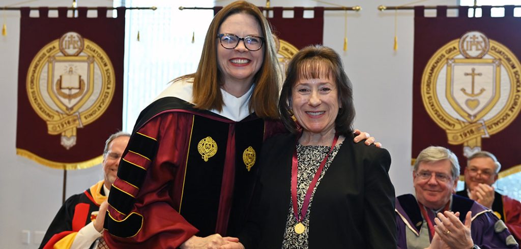 Jean Walsh poses with Fordham President Tania Tetlow