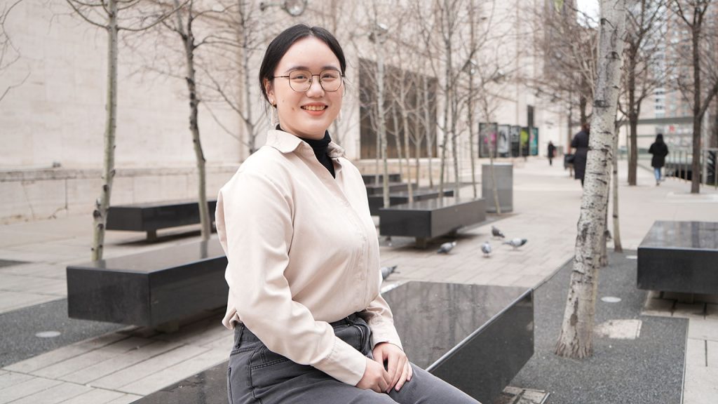 A woman sitting on a bench