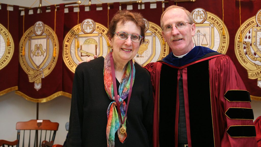 Bernice Glatzer Rosenthal standing next to Joseph M. McShane, smiling for the camera.