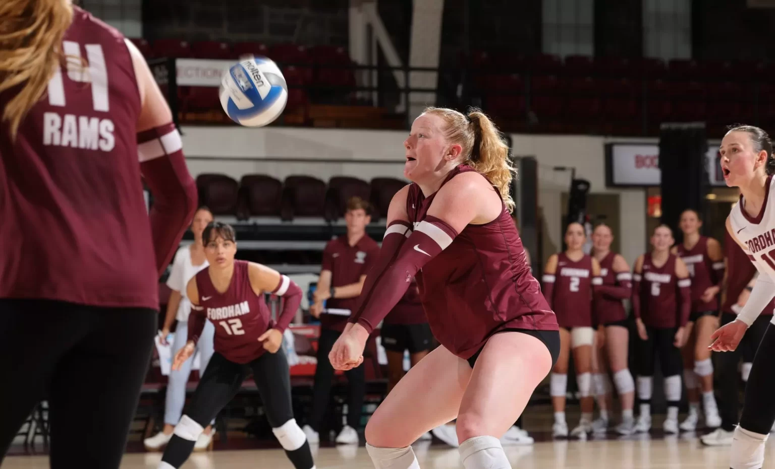 Whitley Moody playing volleyball on court