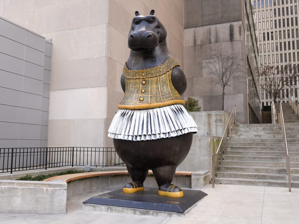 A monumental sculpture of a hippo wearing a tutu