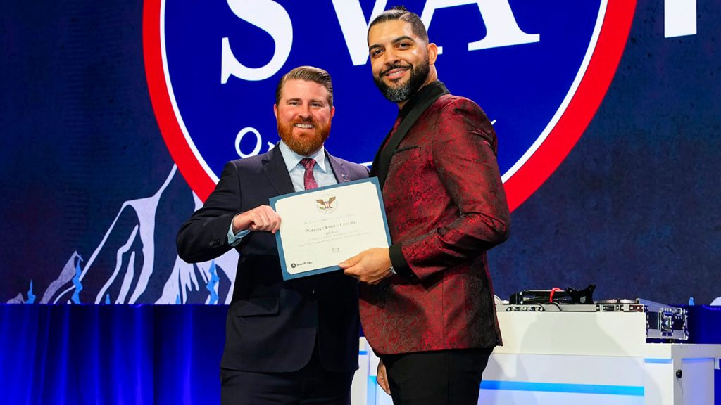 Rico Lucenti receiving the President's Volunteer Service Award