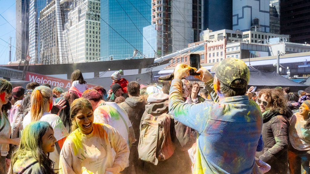 Holi festival, colored powder and participants smiling